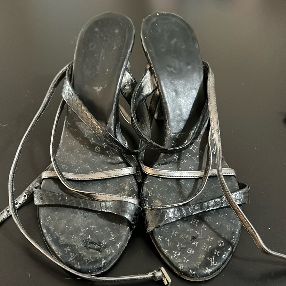 Louis Vuitton worn black snake skin and gunmetal leather straps sandal.